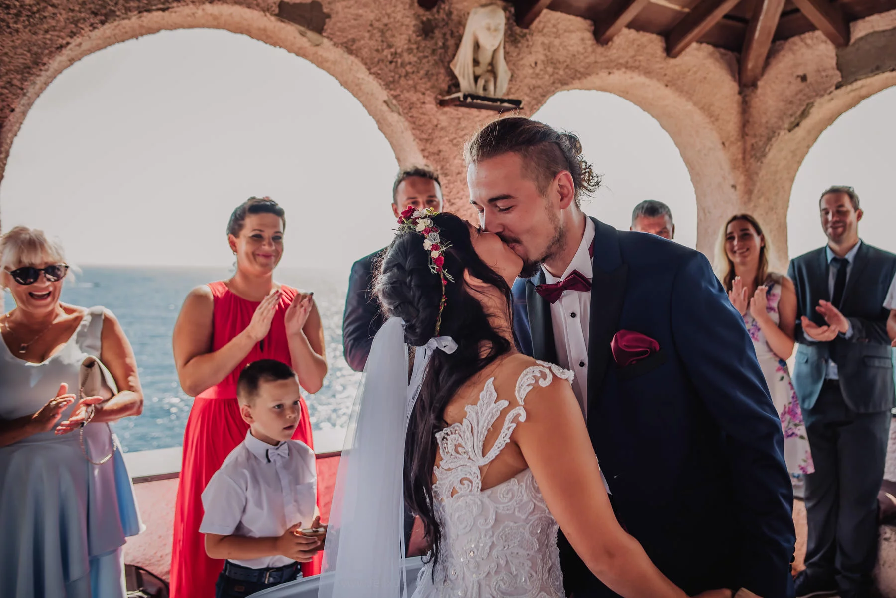 kiss of bride and groom during destination wedding in Italy